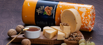 Сыр весовой Салями с грецким орехом 45%~3кг Новопокровский